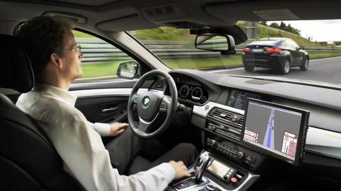Research project Highly automated driving on highways - Dr. Nico Kämpchen on a test drive (08/2011)